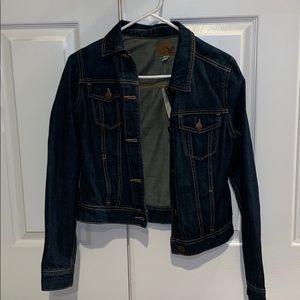 A dark wash jean jacket.